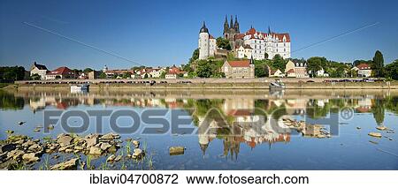 Stock Image - Castle hill with Cathedral and Albrechtsburg Castle is reflected in the river Elbe, Meissen, Saxony, Germany, Europe. Fotosearch
