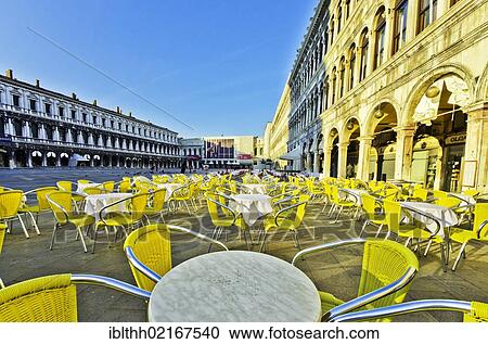 Chairs and tables outside the Cafe Quadri, Piazza San Marco, St. Mark's Square, Venice, Venezia, Veneto, Italy, Europe View Large Photo Image Stock Image - Chairs and tables outside the Cafe Quadri, Piazza San Marco, St. Mark's Square, Venice, Venezia, Veneto, Italy, Europe. Fotosearch