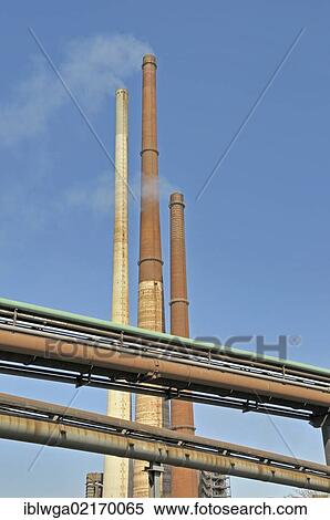 Chimneys of the Schwelgern sinter plant, at front pipes for furnace gas, coke oven gas and mixed gas, ThyssenKrupp Steel works in Hamborn, coking plant and furnaces, Duisburg, North Rhine-Westphalia, Germany, Europe, PublicGround, Europe View Large Photo Image Stock Photography - Chimneys of the Schwelgern sinter plant, at front pipes for furnace gas, coke oven gas and mixed gas, ThyssenKrupp Steel works in Hamborn, coking plant and furnaces, Duisburg, North Rhine-Westphalia, Germany, Europe, PublicGround, Europe. Fotosearch