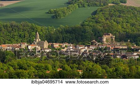 Picture - Church and castle of Saint Saturnin village, Puy de Dome department, Auvergne, France, Europe. Fotosearch