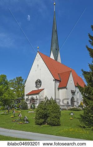 Stock Image - Church Maria-Himmelfahrt with soldiers' graves from the Second World War, Bad Wiessee, Upper Bavaria, Bavaria, Germany, Europe. Fotosearch