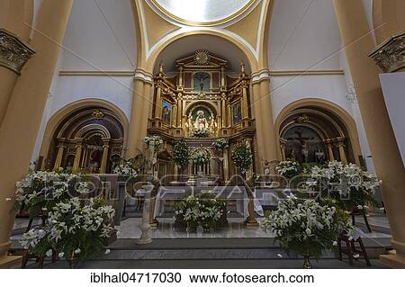 Stock Image - Church Nuestra Señora del Socorro, decorated with flowers, interior, altar, Tejeda, Barranco de Tejeda, Gran Canaria, Canary Islands, Spain, Europe. Fotosearch