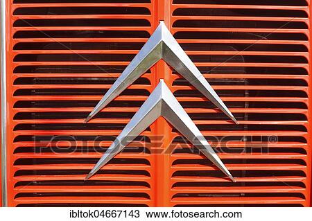 Citroen logo on red radiator grille, vintage car, Citroen van View Large Photo Image Stock Image - Citroen logo on red radiator grille, vintage car, Citroen van. Fotosearch