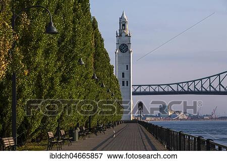 Clock Tower and boardwalk old Montreal at Vieux Port, Montreal, Quebec, Canada, North America View Large Photo Image Stock Photo - Clock Tower and boardwalk old Montreal at Vieux Port, Montreal, Quebec, Canada, North America. Fotosearch