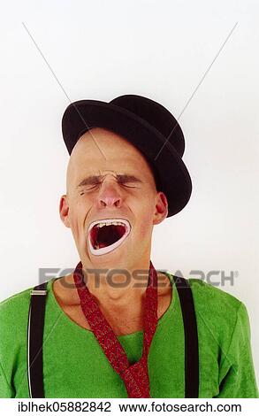 Clown yawns, tired, Berlin, Germany, Europe View Large Photo Image Stock Image - Clown yawns, tired, Berlin, Germany, Europe. Fotosearch