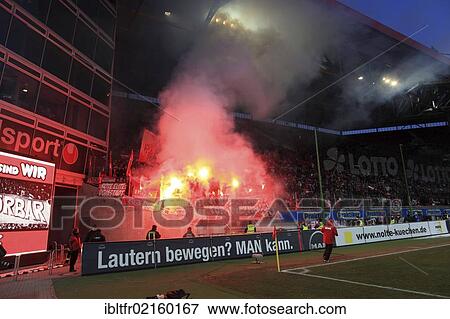 Cologne fans have ignited fireworks, Bundesliga football league, 1. FC Kaiserslautern - 1. FC Cologne, Fritz-Walter-Stadium, Kaiserslautern, Rhineland-Palatinate, Germany, Europe View Large Photo Image Stock Photo - Cologne fans have ignited fireworks, Bundesliga football league, 1. FC Kaiserslautern - 1. FC Cologne, Fritz-Walter-Stadium, Kaiserslautern, Rhineland-Palatinate, Germany, Europe. Fotosearch