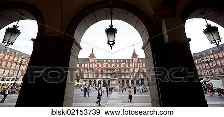 Stock Photo - Colonnade surrounding the historical town square, Plaza Mayor, Madrid, Spain, Europe. Fotosearch