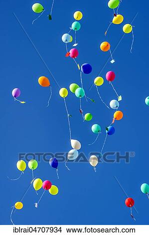 Picture - Colorful balloons rise to the sky, Bad Homburg vor der Höhe, Hesse, Germany, Europe. Fotosearch