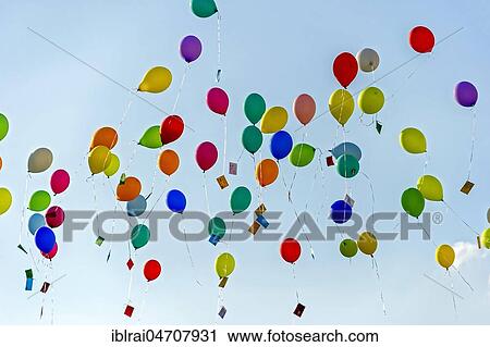Colorful balloons rise to the sky, Bad Homburg vor der Höhe, Hesse, Germany, Europe View Large Photo Image Stock Image - Colorful balloons rise to the sky, Bad Homburg vor der Höhe, Hesse, Germany, Europe. Fotosearch