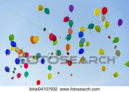 Stock Image - Colorful balloons rise to the sky, Bad Homburg vor der Höhe, Hesse, Germany, Europe. Fotosearch