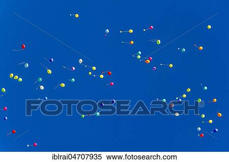 Colorful balloons rise to the sky, Bad Homburg vor der Höhe, Hesse, Germany, Europe View Large Photo Image Stock Photography - Colorful balloons rise to the sky, Bad Homburg vor der Höhe, Hesse, Germany, Europe. Fotosearch