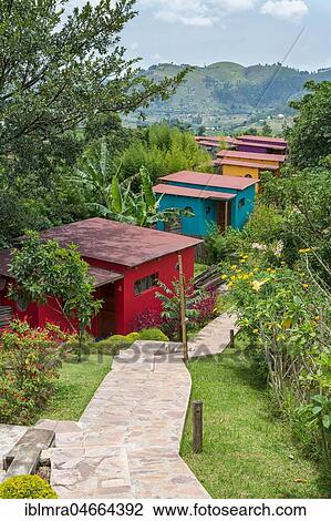 Stock Image - Colorful houses of Chameleon Hill Lodge, Kampala, Uganda, Africa. Fotosearch