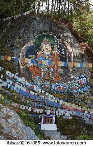 Colourful rock painting, petroglyphs, Guru Rinpoche, Padmasambhava, colourful prayer flags, near Thimphu, Kingdom of Bhutan, South Asia, Asia View Large Photo Image Stock Photography - Colourful rock painting, petroglyphs, Guru Rinpoche, Padmasambhava, colourful prayer flags, near Thimphu, Kingdom of Bhutan, South Asia, Asia. Fotosearch