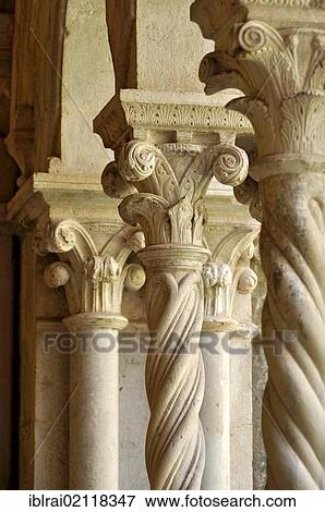 Columns with ornate capitals in the cloister of the Gothic basilica of the Cistercian monastery Fossanova Abbey, near Priverno, Lazio, Italy, Europe View Large Photo Image Stock Photo - Columns with ornate capitals in the cloister of the Gothic basilica of the Cistercian monastery Fossanova Abbey, near Priverno, Lazio, Italy, Europe. Fotosearch