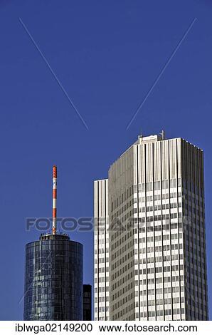 Stock Image - Commerzbank Tower in front of Main Tower, Landesbank Hesse-Thueringen, Frankfurt, Hesse, Germany, Europe, PublicGround, Europe. Fotosearch