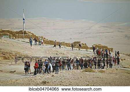 Stock Photography - Communion procession at the Herod Fortress of Masada, symbol of Israeli freedom on the Dead Sea, Israel, Asia. Fotosearch