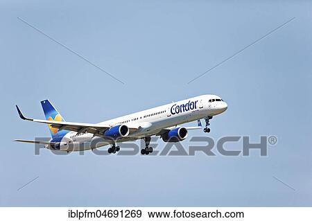 Condor Boeing 757-300 passenger aircraft, on landing approach to Franz Josef Strauss Airport, Munich, Upper Bavaria, Germany, Europe View Large Photo Image Stock Photo - Condor Boeing 757-300 passenger aircraft, on landing approach to Franz Josef Strauss Airport, Munich, Upper Bavaria, Germany, Europe. Fotosearch