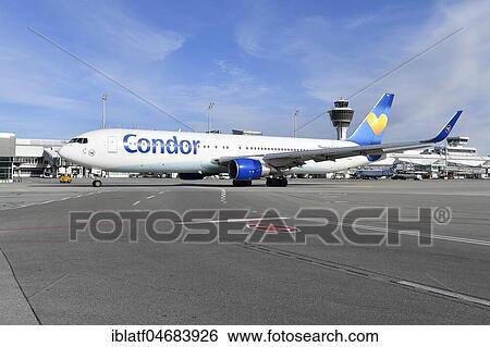 Condor, Boeing, B737, taxiing in front of Terminal 1, Munich Airport, Upper Bavaria, Bavaria, Germany, Europe View Large Photo Image Stock Photograph - Condor, Boeing, B737, taxiing in front of Terminal 1, Munich Airport, Upper Bavaria, Bavaria, Germany, Europe. Fotosearch