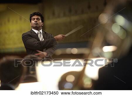 Conductor Leslie Suganandarajah, Koblenz, Rhineland-Palatinate, Germany, Europe View Large Photo Image Stock Image - Conductor Leslie Suganandarajah, Koblenz, Rhineland-Palatinate, Germany, Europe. Fotosearch