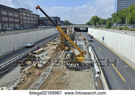 Construction site, roadworks on the A59 motorway, Autobahn, running through the town centre of Duisburg, North Rhine-Westphalia, Germany, Europe, PublicGround, Europe View Large Photo Image Stock Photo - Construction site, roadworks on the A59 motorway, Autobahn, running through the town centre of Duisburg, North Rhine-Westphalia, Germany, Europe, PublicGround, Europe. Fotosearch