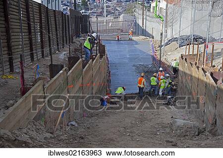 Construction workers build a new pedestrian border crossing between San Ysidro, California, USA, and Tijuana, Mexico, North America View Large Photo Image Stock Image - Construction workers build a new pedestrian border crossing between San Ysidro, California, USA, and Tijuana, Mexico, North America. Fotosearch