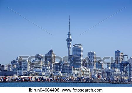 Stock Photograph - Container harbour and skyline of Auckland, New Zealand, Oceania. Fotosearch