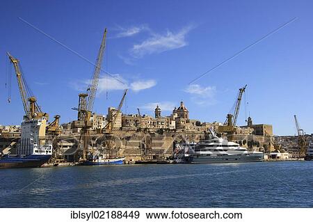 Cranes and yachts, port of Valletta, Malta, Europe View Large Photo Image Stock Photo - Cranes and yachts, port of Valletta, Malta, Europe. Fotosearch