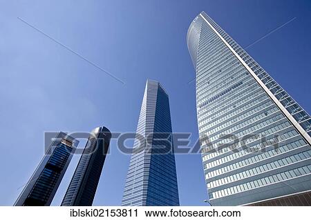 Stock Image - Cuatro Torres Business Centre, CTBC, with the tower of Torre Caja Madrid, left, headquarters of the Spanish bank Caja Madrid, with 249. 5 metres the tallest building in Spain, in Madrid, Spain, Europe. Fotosearch