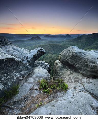 Dawn at Kleiner Winterberg, view of Lorenzsteine and Hinteres Raubschloss or Winterstein, Elbe Sandstone Mountains, Saxon Switzerland National Park, Saxony, Germany, Europe View Large Photo Image Stock Photograph - Dawn at Kleiner Winterberg, view of Lorenzsteine and Hinteres Raubschloss or Winterstein, Elbe Sandstone Mountains, Saxon Switzerland National Park, Saxony, Germany, Europe. Fotosearch