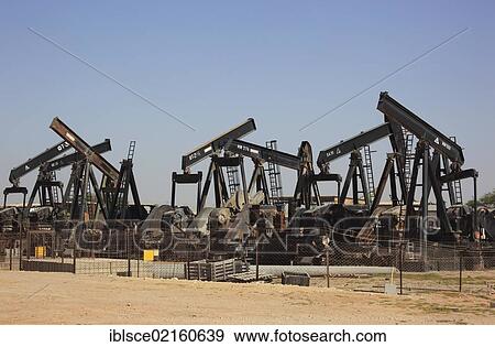 Depot with worn-out oil pumps near Marmul, Oman, Arabian Peninsula, Middle East, Asia View Large Photo Image Stock Photo - Depot with worn-out oil pumps near Marmul, Oman, Arabian Peninsula, Middle East, Asia. Fotosearch