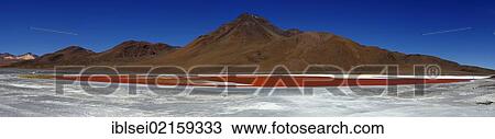 Stock Image - Desert landscape with Laguna Colorada lagoon, Desierto, Uyuni, Bolivia, South America. Fotosearch