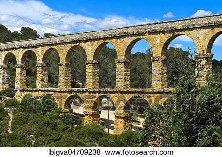 Devil's Bridge, Aqüeducte de les Ferreres, Pont del Diable, UNESCO World Heritage Site Archaeological Ensemble of Tarraco, Tarragona, Catalonia, Spain, Europe View Large Photo Image Stock Photo - Devil's Bridge, Aqüeducte de les Ferreres, Pont del Diable, UNESCO World Heritage Site Archaeological Ensemble of Tarraco, Tarragona, Catalonia, Spain, Europe. Fotosearch