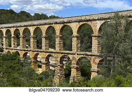Devil's Bridge, Aqüeducte de les Ferreres, Pont del Diable, UNESCO World Heritage Site Archaeological Ensemble of Tarraco, Tarragona, Catalonia, Spain, Europe View Large Photo Image Stock Photo - Devil's Bridge, Aqüeducte de les Ferreres, Pont del Diable, UNESCO World Heritage Site Archaeological Ensemble of Tarraco, Tarragona, Catalonia, Spain, Europe. Fotosearch
