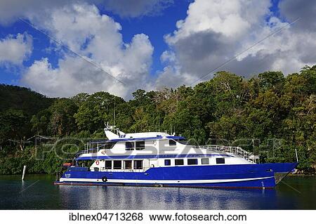 Stock Photo - Diving boat, Tawali Island, Milne Bay, Alotau, Papua New Guinea, Oceania. Fotosearch