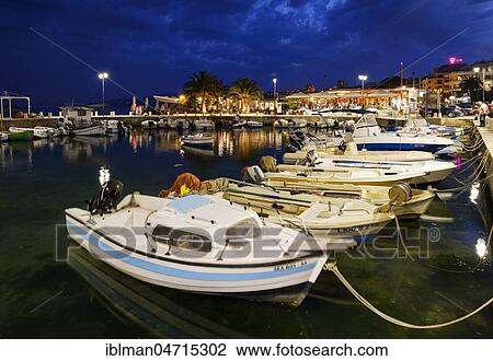 Dusk at the fishing harbour, Saranda, Sarandë, Qark Vlora, Ionian Sea, Albania, Europe View Large Photo Image Stock Image - Dusk at the fishing harbour, Saranda, Sarandë, Qark Vlora, Ionian Sea, Albania, Europe. Fotosearch
