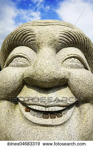 Ebisu Buddha with coins in his mouth, Kumano Nachi Taisha Grand Shrine, Nakahechi Route, Kumano Kodo Pilgrimage, Kii-Mountains, Wakayama, Honshu Island, Japan, Asia View Large Photo Image Stock Photo - Ebisu Buddha with coins in his mouth, Kumano Nachi Taisha Grand Shrine, Nakahechi Route, Kumano Kodo Pilgrimage, Kii-Mountains, Wakayama, Honshu Island, Japan, Asia. Fotosearch