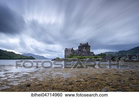 Eilean Donan Castle with cloudy sky, Dornie, Highlands, Scotland, Great Britain View Large Photo Image Stock Image - Eilean Donan Castle with cloudy sky, Dornie, Highlands, Scotland, Great Britain. Fotosearch