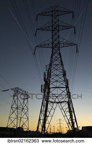 Stock Image - Electricity pylons at dusk, American Canyon, California, USA, North America. Fotosearch