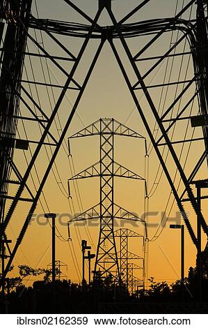 Electricity pylons at sunset, dusk, American Canyon, California, USA, North America View Large Photo Image Stock Photo - Electricity pylons at sunset, dusk, American Canyon, California, USA, North America. Fotosearch