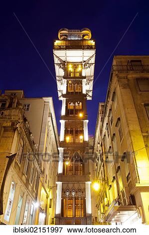 Stock Photo - Elevador de Santa Justa, Santa Justa Elevator, at night, connecting the two historic districts of Baixa and Chiado, Lisbon, Portugal, Europe. Fotosearch