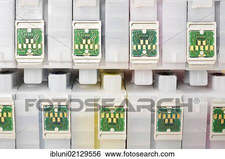 Stock Photograph - Empty ink cartridges of an inkjet printer. Fotosearch