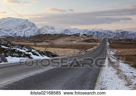 Stock Photography - Empty road in the Lofoten Islands in winter, Norway, Europe. Fotosearch