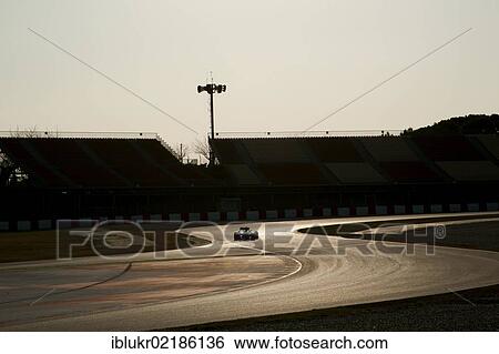 Stock Photograph - Evening mood during the Formula 1 testing sessions, 21-24/2/2012, at the Circuit de Catalunya in Barcelona, Spain, Europe. Fotosearch