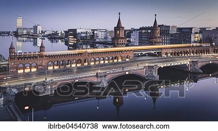 Stock Photo - Evening view of the Oberbaum Bridge in Berlin, Berlin, Germany, Europe. Fotosearch