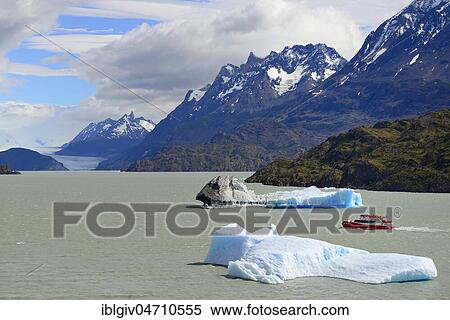 Stock Photography - Excursion boat on Lake Grey with ice floes, Grey glacier in the background, Torres del Paine National Park, Última Esperanza Province, Chile, South America. Fotosearch