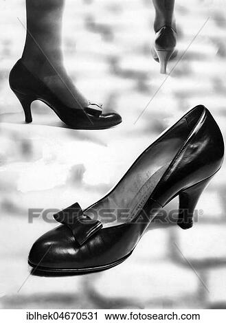 Stock Image - Fashion, shoe fashion, fashion photography of high heels, 1950s, Germany, Europe. Fotosearch