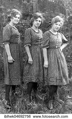 Fashion, three sisters in the same clothes, 1930s, Germany, Europe View Large Photo Image Stock Photograph - Fashion, three sisters in the same clothes, 1930s, Germany, Europe. Fotosearch