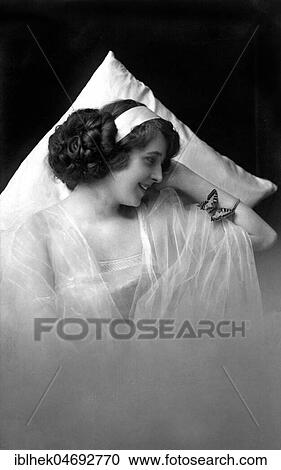 Fashion, woman in a negligee with butterfly, 1910s, Germany, Europe View Large Photo Image Stock Image - Fashion, woman in a negligee with butterfly, 1910s, Germany, Europe. Fotosearch