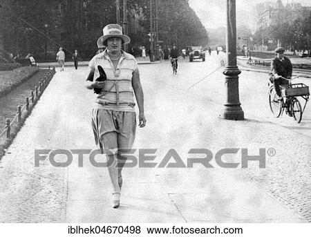 Fashion, woman walking on a street, 1920s, Berlin, Germany, Europe View Large Photo Image Stock Photo - Fashion, woman walking on a street, 1920s, Berlin, Germany, Europe. Fotosearch