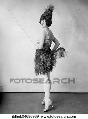 Stock Photo - Fashion, woman with feather skirt, 1920s, Germany, Europe. Fotosearch